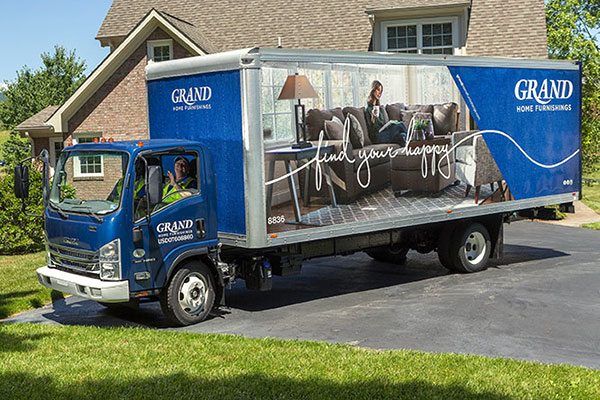 Grand Delivery Truck making a delivery